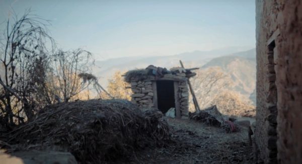 A menstrual shed sits on a hilly ridge trees in the village of Chulthe in western Nepal